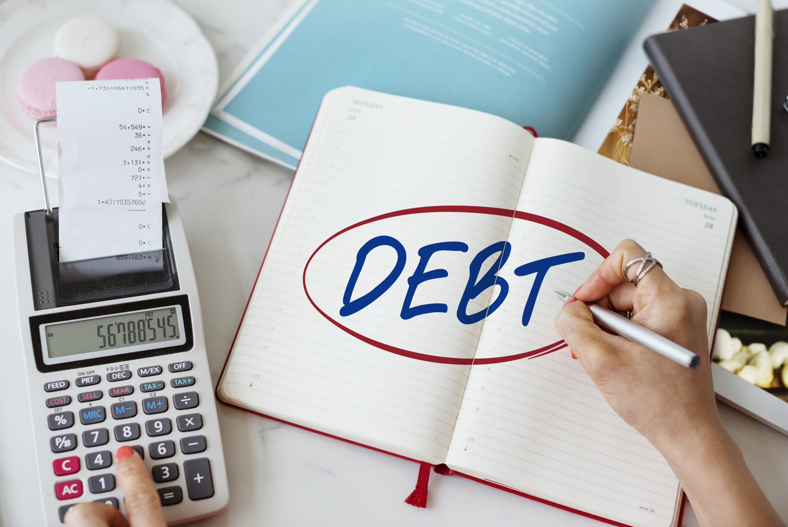 Debt Consolidation Loan in Ahmedabad: How to Reduce EMI & Close High-Interest Loans Faster