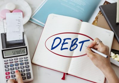 Debt Consolidation Loan in Ahmedabad: How to Reduce EMI & Close High-Interest Loans Faster